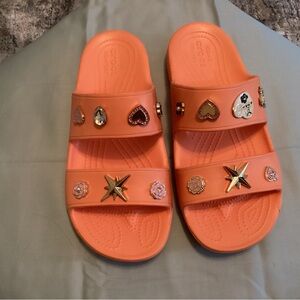 Womens  CROCS peach size 10 never worn.